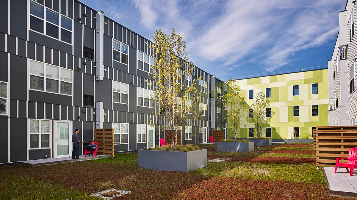 Paseo Verde, in North Philadelphia, has an internal courtyard with trees that residents can access and look at from their apartments.